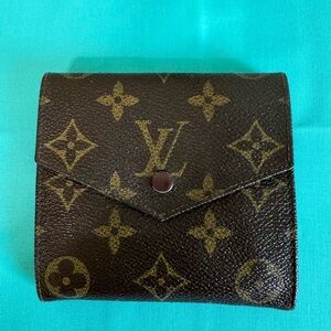 Louis Vuitton Double. Snap Monogram Wallet